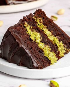 rich chocolate cake with crushed pistachios
