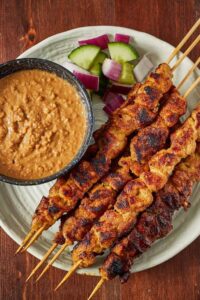 Satay is juicy meat— which is chicken, beef, or lamb
