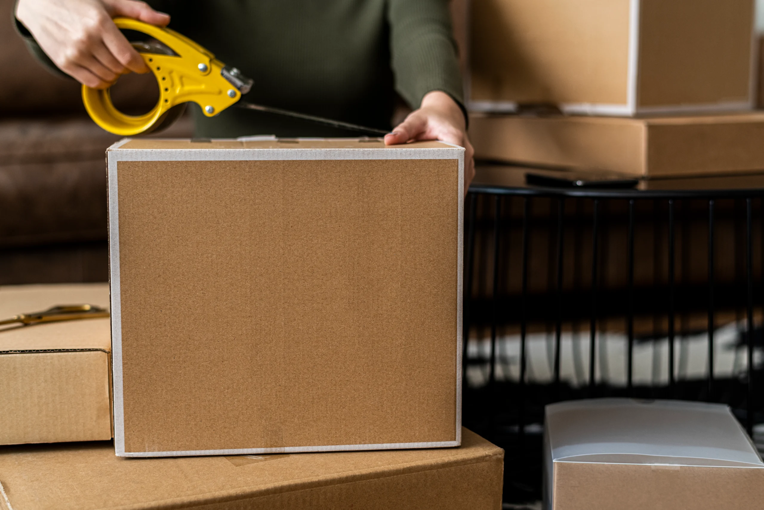 small-business-owner-packing-product-parcel-boxes